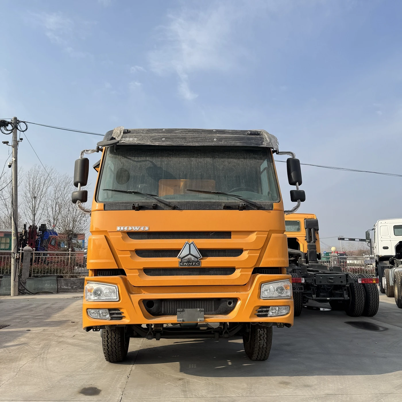 Caractéristiques de sécurité des camions à benne basculante : alarmes de secours, systèmes de cam...